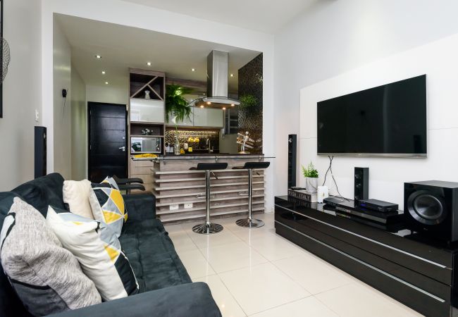 Sala de Estar Sala de estar com televisão