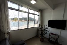 Apartamento em São Vicente - Kitnet pé na areia com Wi-Fi em São Vicente