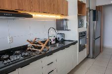 Apartamento em Praia Grande - Apto com churrasqueira e wi-fi à 650m da praia