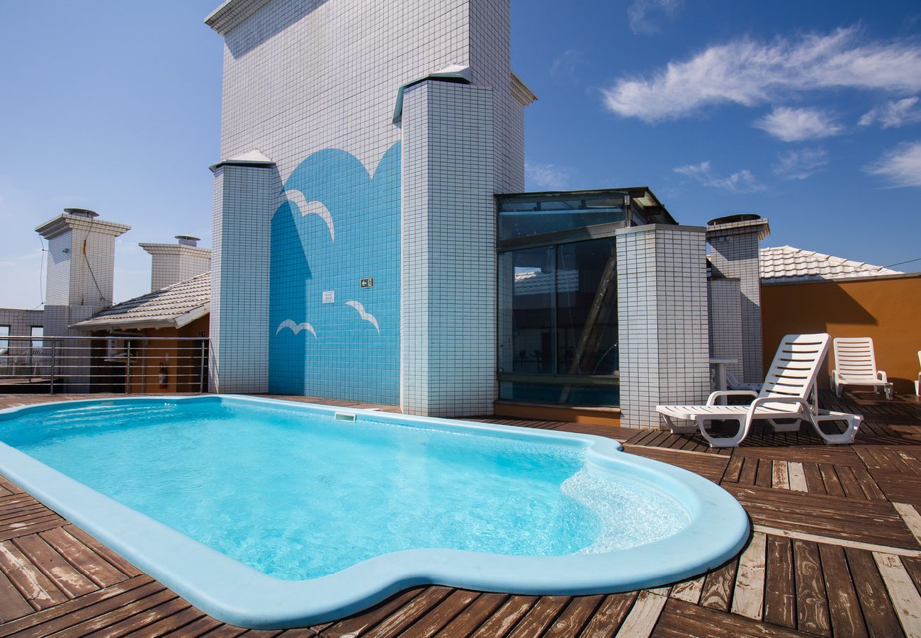 Apartamento em Capão da Canoa - Apto c churrasq, piscina e wi-fi a 200m da praia Apartamento em Capão da Canoa - Apto c churrasq, piscina e wi-fi a 200m da praia