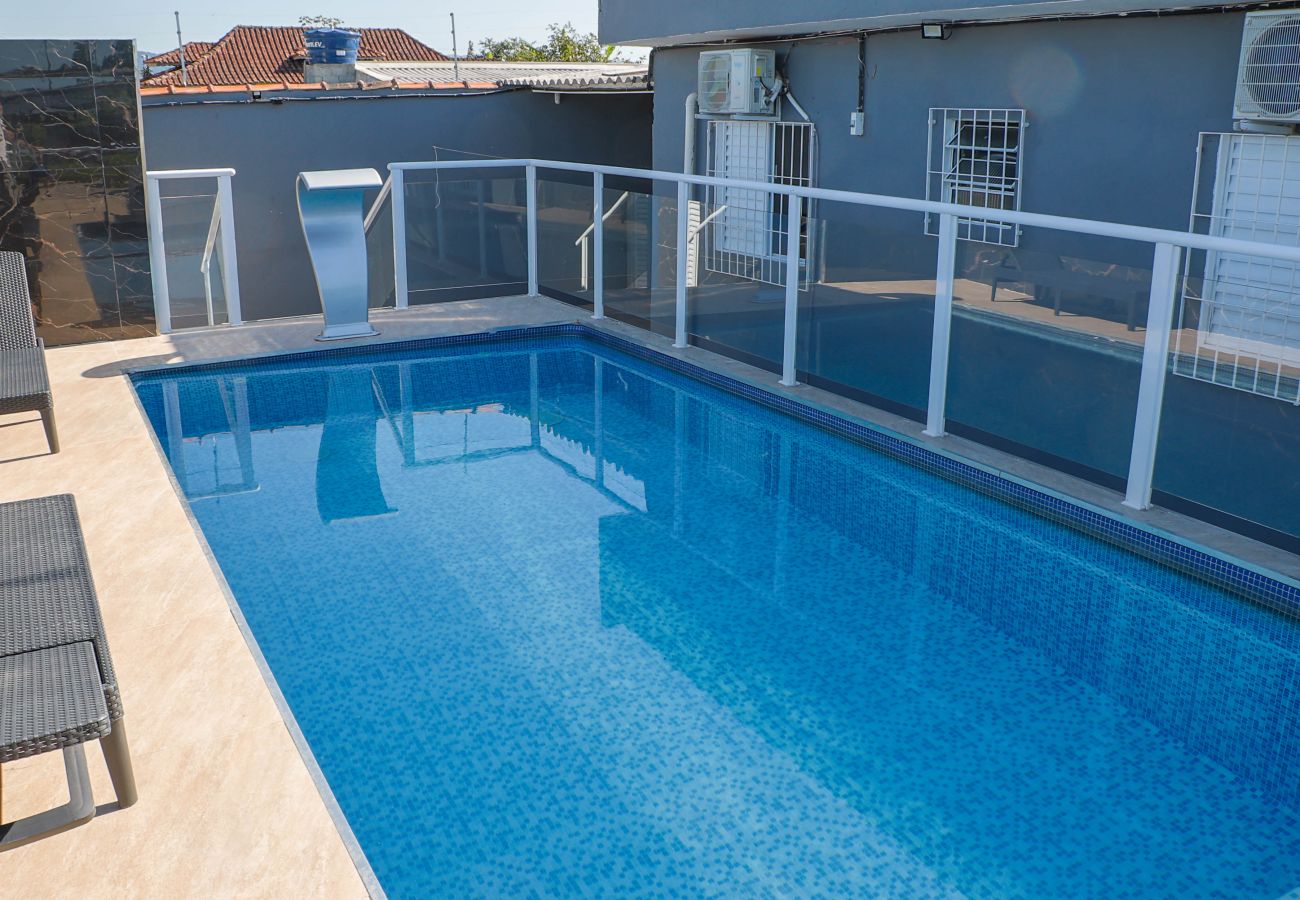 Casa em Peruíbe - Casa completa com piscina e churrasq, pet friendly Casa em Peruíbe - Casa completa com piscina e churrasq, pet friendly