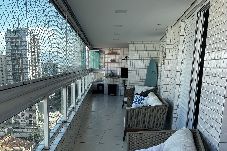 Apartamento em Praia Grande - Apto c wifi, churrasq, pet friendly a 120m do mar
