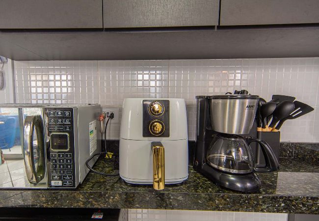 Apartamento em Praia Grande - Apto c Churrasqueira e Garagem na Praia da Caiçara Apartamento em Praia Grande - Apto c Churrasqueira e Garagem na Praia da Caiçara