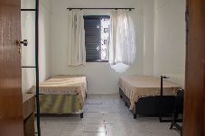 Apartamento em Praia Grande - Apartamento Pet Friendly c Garagem a 400m da Praia