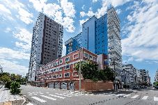 Apartamento em Praia Grande - Apartamento a 550 m da praia com Wi-Fi e Garagem