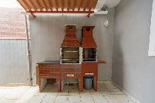 Casa em Praia Grande - Casa com Piscina e Churrasqueira a 220 m da Praia