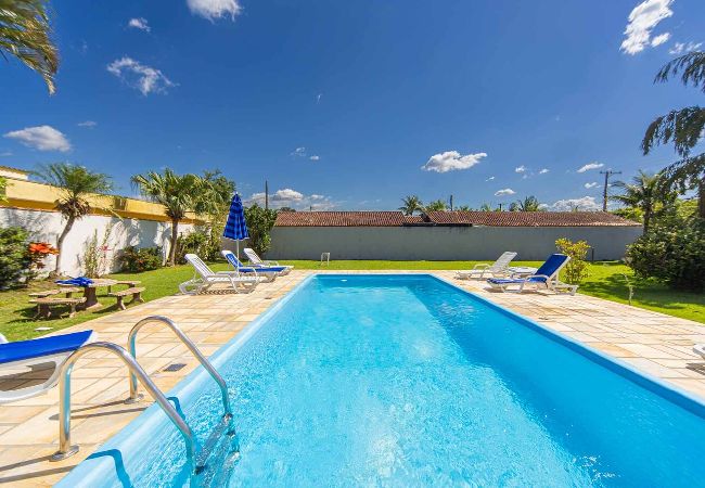 Casa em Bertioga - Casa com Piscina e Churrasqueira no Jardim Indaiá