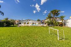 Casa em Bertioga - Casa com Piscina e Churrasqueira no Jardim Indaiá