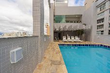 Apartamento em Santos - Loft p/ 4 no Gonzaga | Piscina, Academia e Garagem