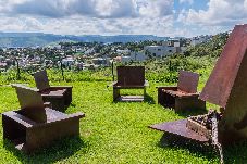 Casa em Capitólio - Casa com Piscinas, Sauna e Playground em Escarpas