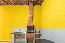 Casa em Bertioga - Casa para 15 com Churrasqueira e Ar a 35m da Praia