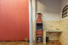 Casa em Praia Grande - Casa Pet Friendly c Churrasqueira a 500m da Praia