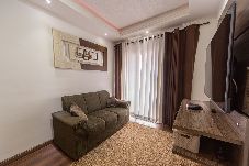 Apartamento em Praia Grande - Apartamento Beira Mar com Varanda e Churrasqueira