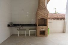 Casa em Bertioga - Casa com Piscina e Ar a 700m da Praia de Guaratuba