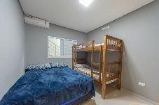 Casa em Praia Grande - Casa com Sinuca e Churrasqueira a 5 min da Praia