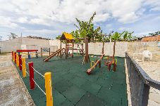 Apartamento em Bertioga - Apto com Piscina e Vaga a 750m da Praia da Enseada