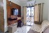 Apartamento em Bertioga - Apto com Piscina e Vaga a 750m da Praia da Enseada